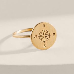 Gold WORLD TRAVELER COMPASS RING Francesca’s